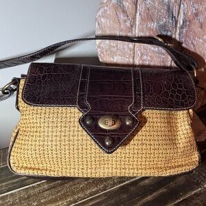 Kate Landry Small Straw Purse featuring a woven straw body, brown leather trim